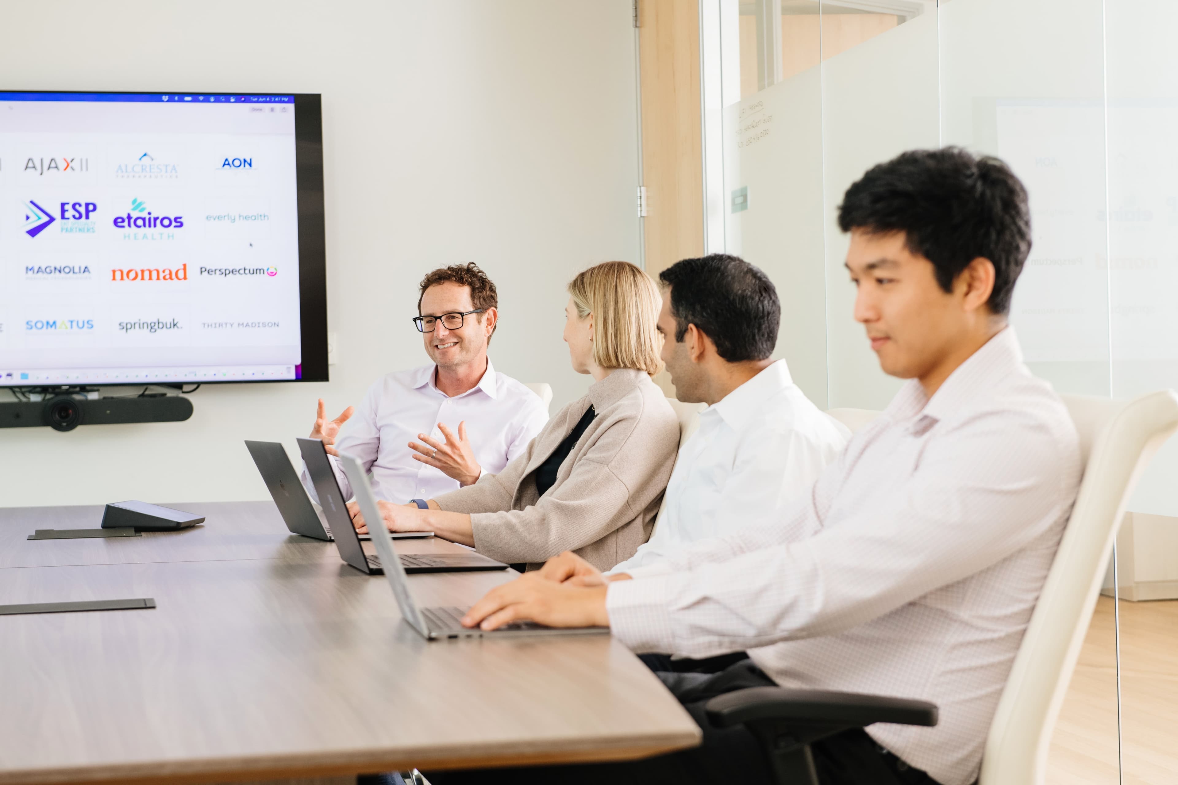 discussion around a meeting table 